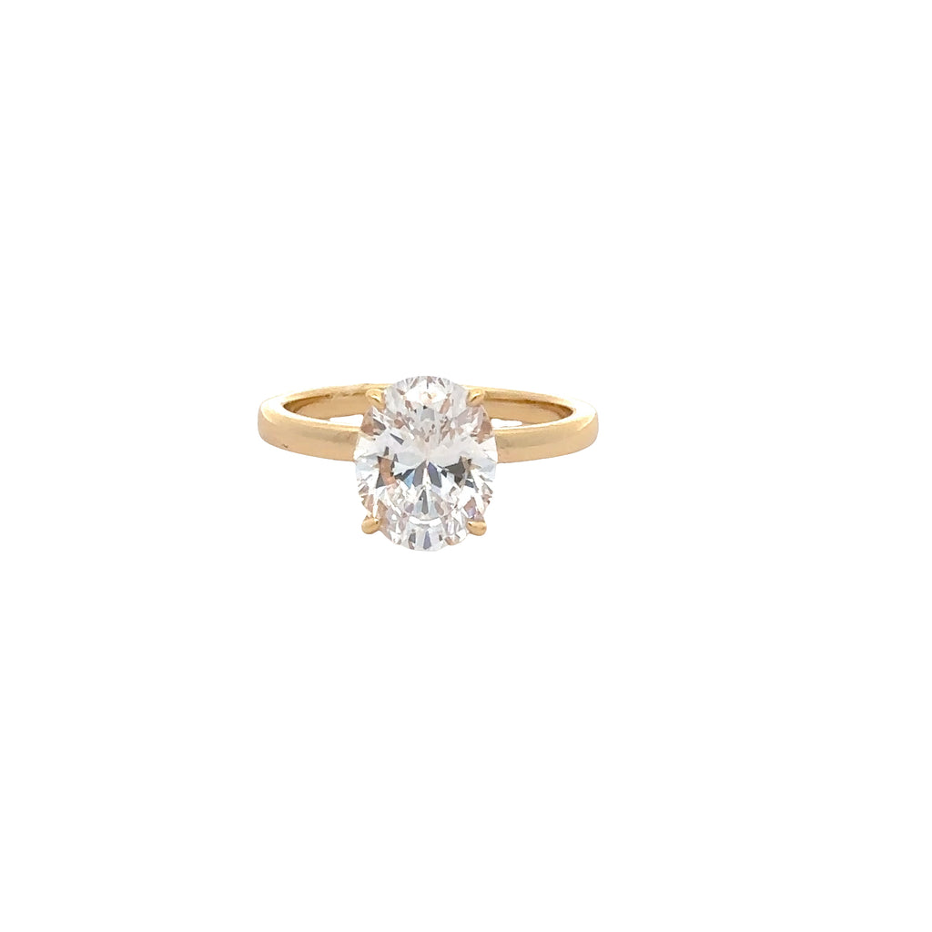 GOLD OVAL SOLITAIRE RING WITH ZIRCONIA