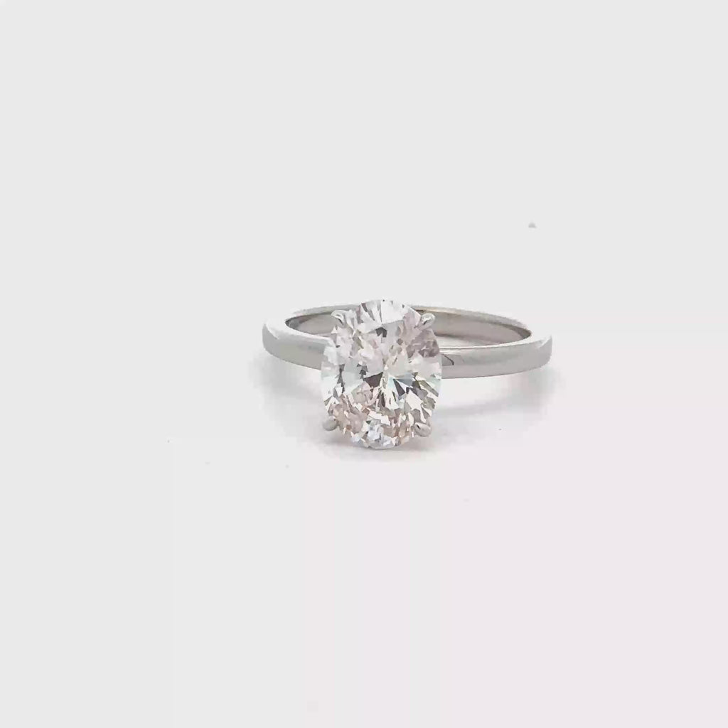 SILVER OVAL SOLITAIRE RING WITH ZIRCONIA