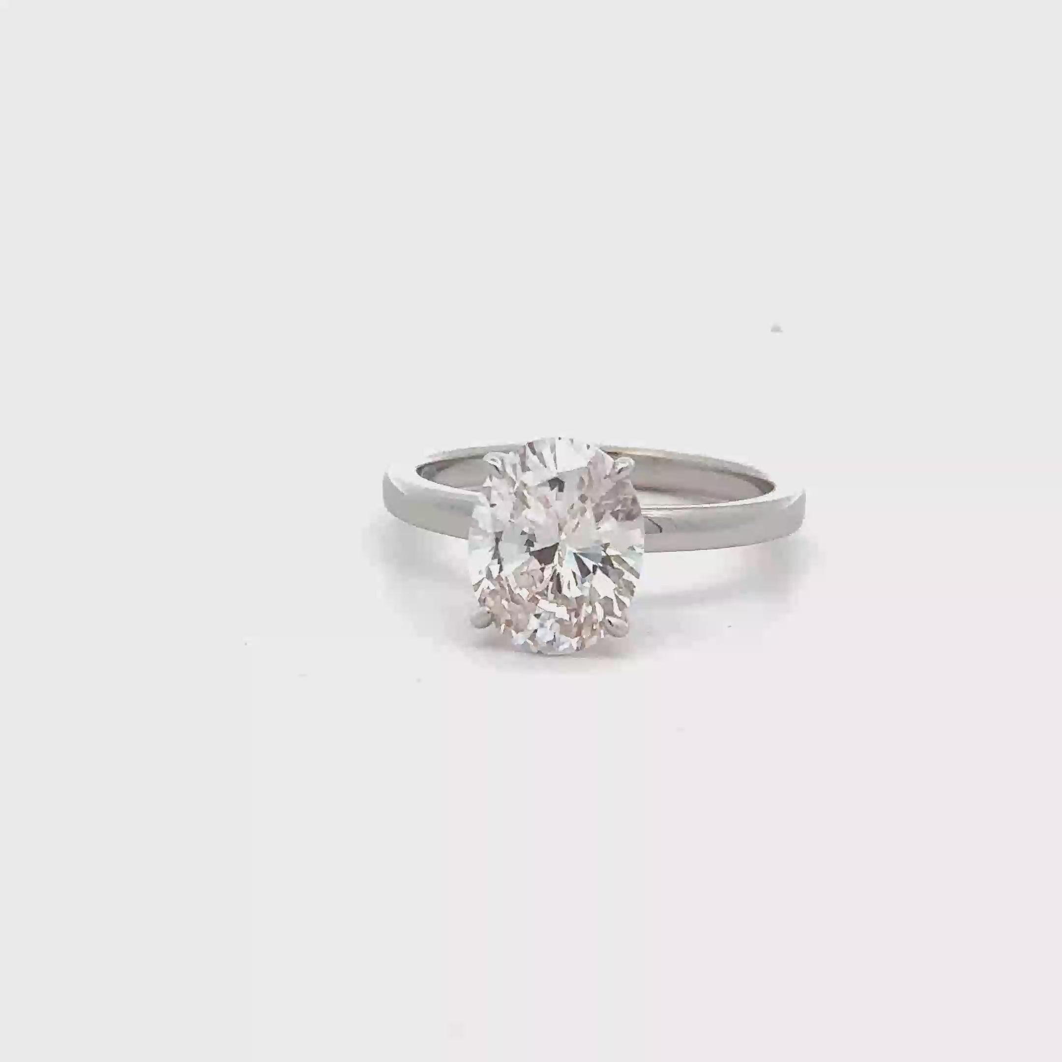 SILVER OVAL SOLITAIRE RING WITH ZIRCONIA